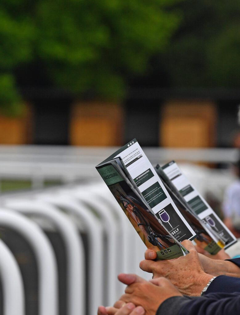 Racegoers with guides