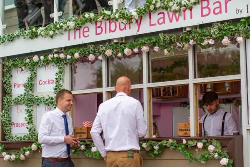 two men ordering a drink at the bibury lawn bar