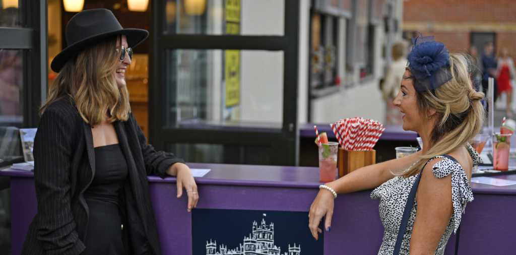 two women at a gin bar