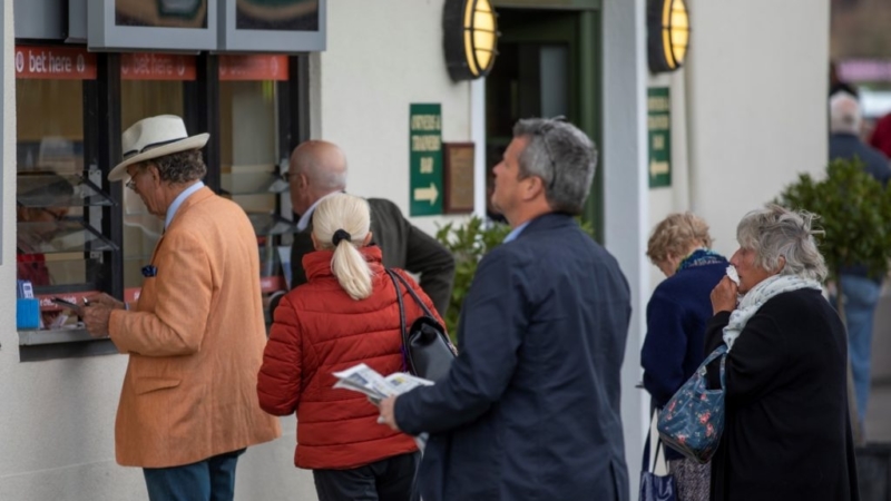 group waiting to bet