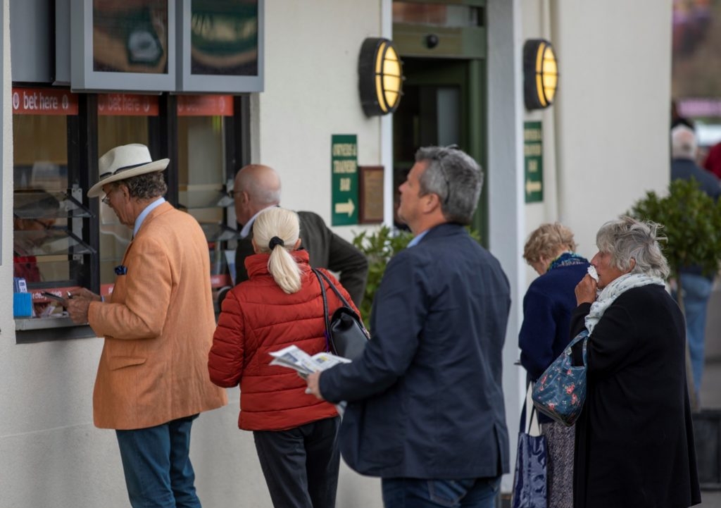 group waiting to bet