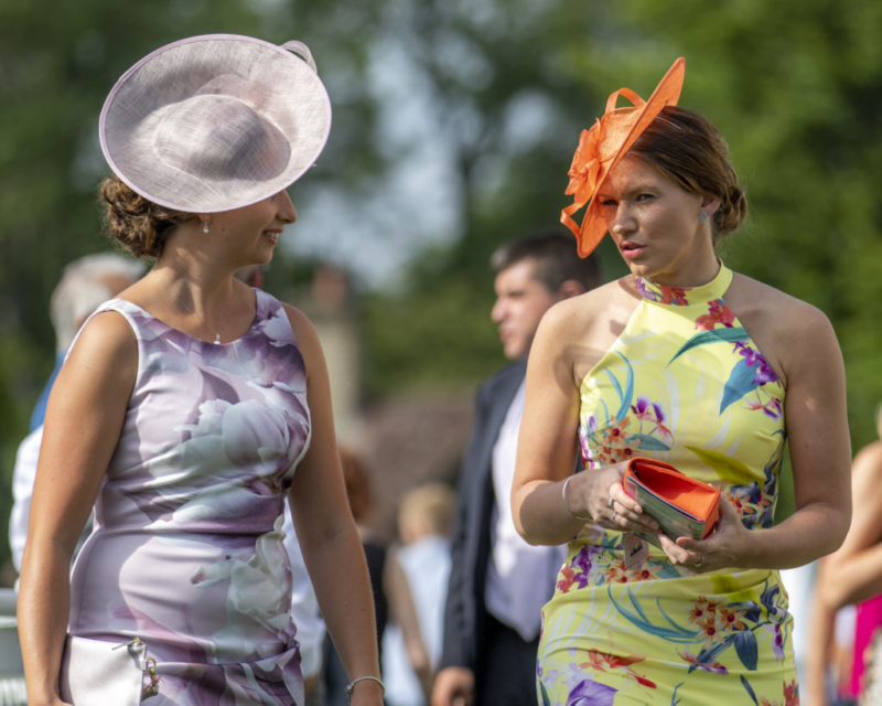 two-women-dressed-up-ladies-day